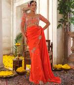 Orange embroidered silk saree