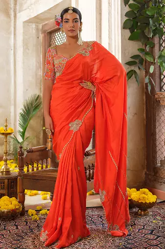 Orange embroidered silk saree