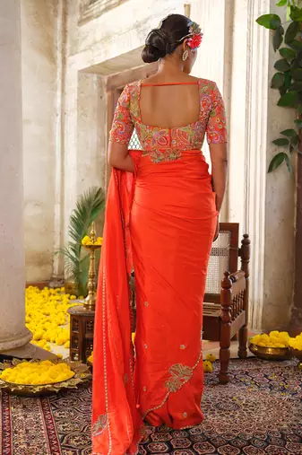 Orange embroidered silk saree