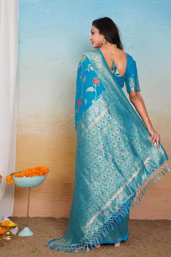 Sky Blue Dola Art Silk Saree with Rich Zari Weaving & Floral Thread Work by Maharanga