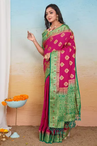 Rani Pink Dola Art Silk Saree with Zari & Thread Butta Work and Rich Green Contrast Border by Maharanga