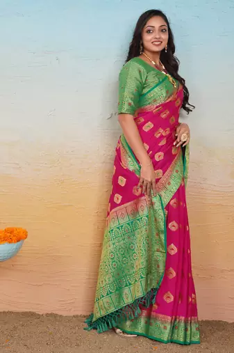 Rani Pink Dola Art Silk Saree with Zari & Thread Butta Work and Rich Green Contrast Border by Maharanga