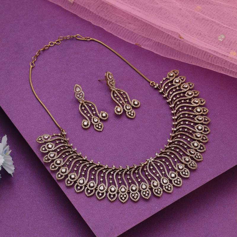 Gold color american diamond necklace set