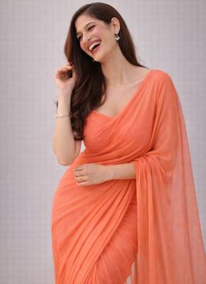Coral color plain georgette designer saree with blouse 4