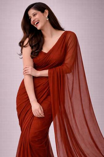 Rust color plain georgette designer saree with blouse