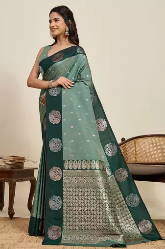 green banarasi soft art silk saree with gold silver zari border