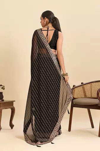 black sequin embroidered georgette fancy saree with designer lace border
