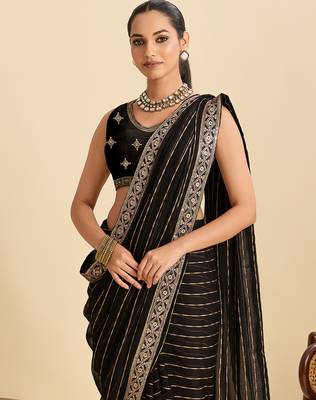 black sequin embroidered georgette fancy saree with designer lace border 4