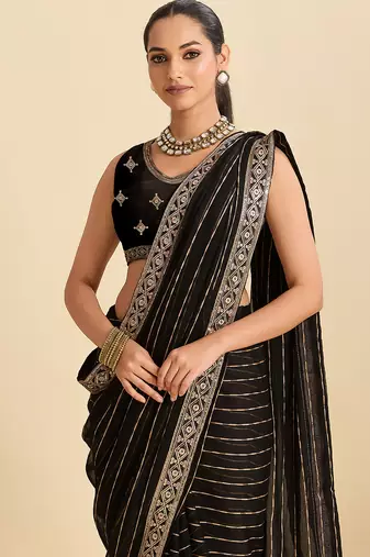 black sequin embroidered georgette fancy saree with designer lace border