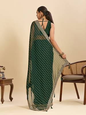 green embroidered georgette fancy saree with striped body and heavy pallu 2