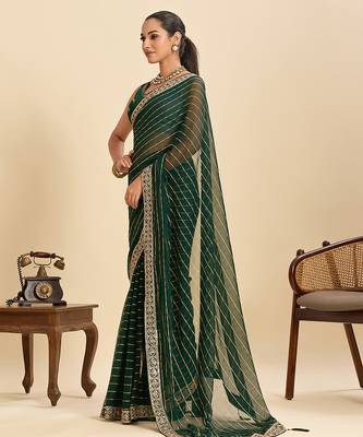 green embroidered georgette fancy saree with striped body and heavy pallu 3