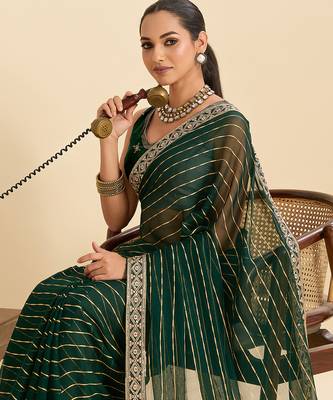 green embroidered georgette fancy saree with striped body and heavy pallu 4