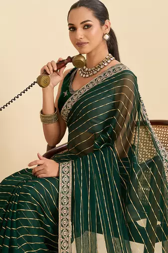 green embroidered georgette fancy saree with striped body and heavy pallu