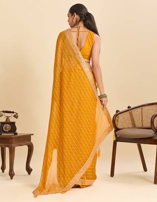 mustard party wear georgette fancy saree with embroidery and designer pallu 2