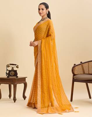 mustard party wear georgette fancy saree with embroidery and designer pallu 3