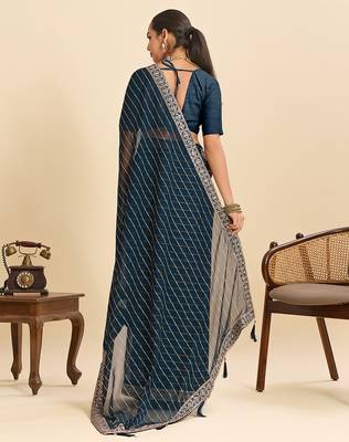teal georgette fancy saree with sequin work and stylish border design 2