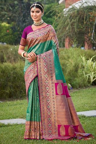rama green color banarasi silk blend woven weaving work saree