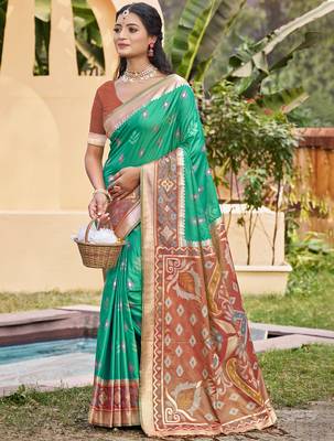 rama green color pochampally silk blend weaving work saree 1