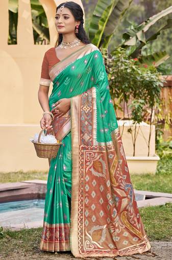 rama green color pochampally silk blend weaving work saree