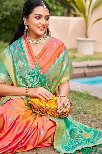 Orange color pochampally silk blend weaving work saree