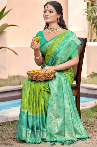 rama green color pochampally silk blend weaving work saree