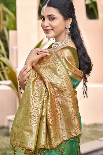 rama green color pochampally silk blend weaving work saree