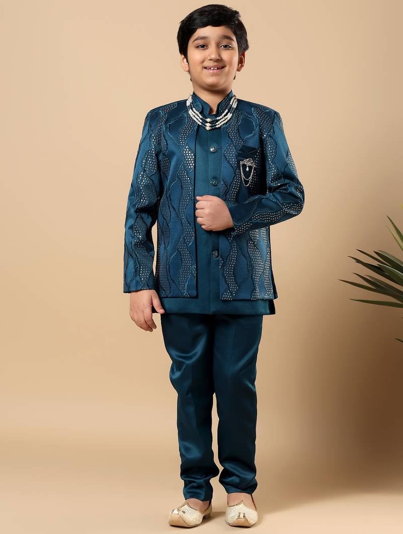 Boys teal blue satin wavy embroidered sequined sherwani & trouser set with shrug and necklace