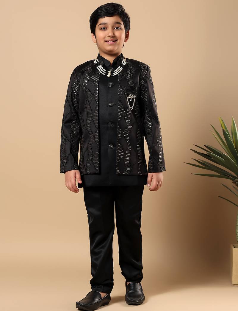 Boys black satin wavy embroidered sequined sherwani & trouser set with shrug and necklace