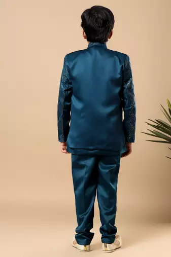 Boys teal blue satin wavy embroidered sequined sherwani & trouser set with shrug and necklace