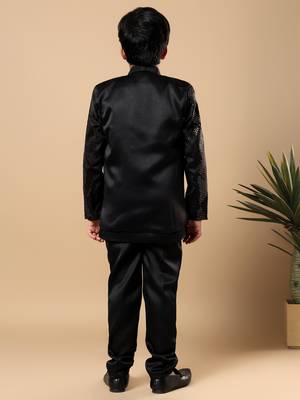 Boys black satin wavy embroidered sequined sherwani & trouser set with shrug and necklace 2