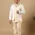 Boys fawn cotton silk diamond buti sequined sherwani & trouser set with shrug and necklace