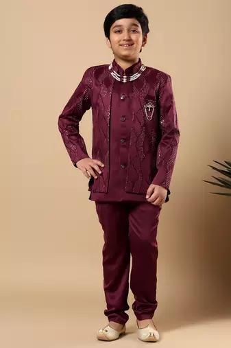 Boys burgundy satin wavy embroidered sequined sherwani & trouser set with shrug and necklace