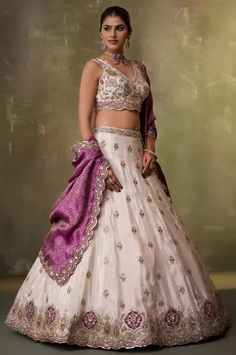 Beige tissue fabric sequins and thread embroidery semi-stitched lehenga set with blouse and pink dupatta
