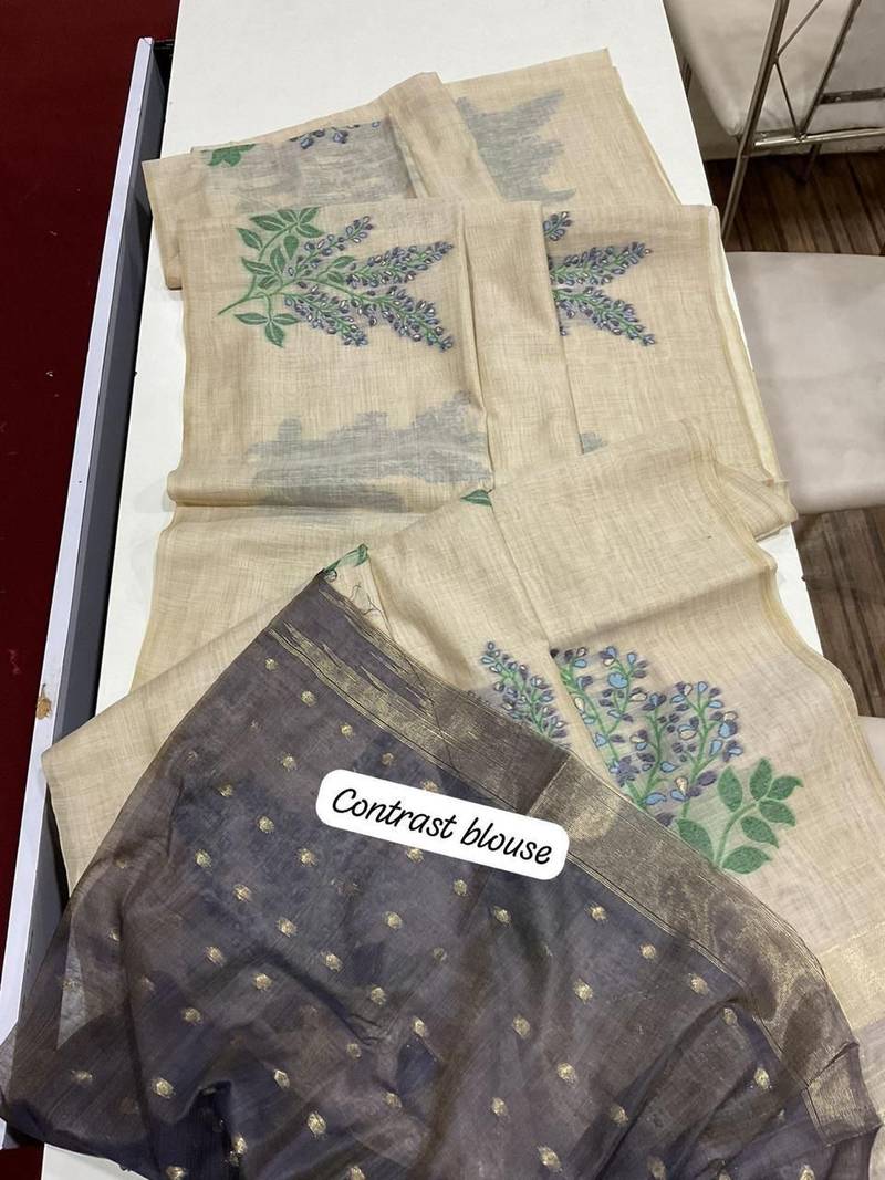 Cream woven muga cotton saree with blouse piece