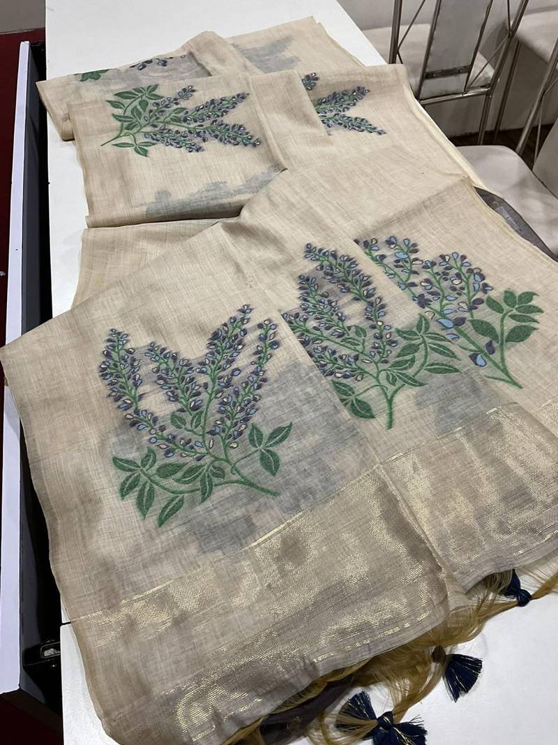 Cream woven muga cotton saree with blouse piece