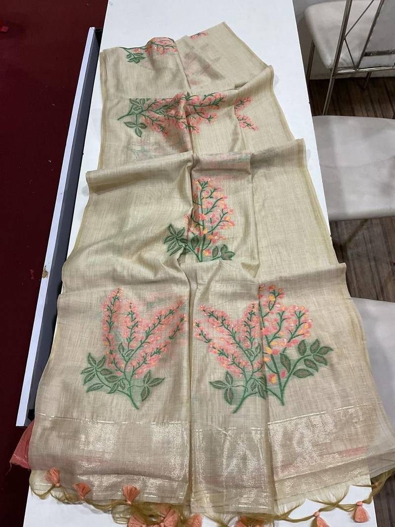 Cream woven muga cotton saree with blouse piece