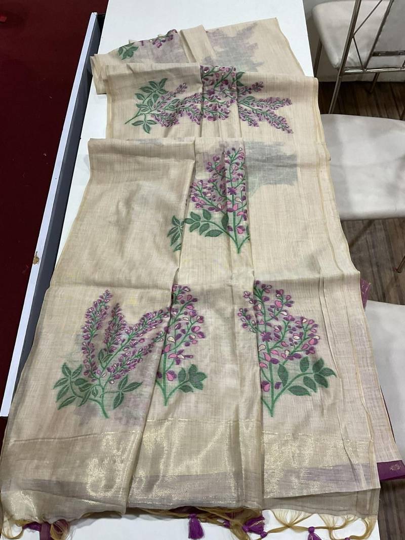 Cream woven muga cotton saree with blouse piece