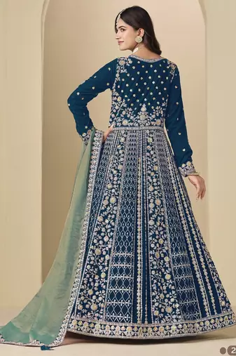 Teal velvet anarkali suits with heavy embroidery 
