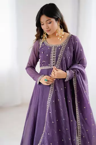 Purple anarkali set with intricate embroidery work