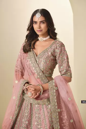 Pink Art Silk Semi Stitched Lehenga Choli with Heavy Embroidery Work