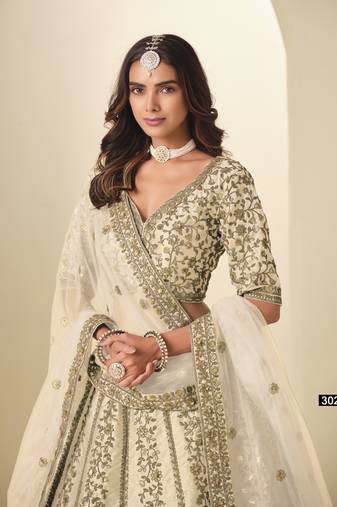 White Art Silk Semi Stitched Lehenga Choli with Heavy Embroidery Work