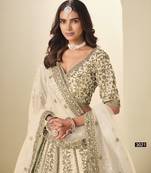 White Art Silk Semi Stitched Lehenga Choli with Heavy Embroidery Work