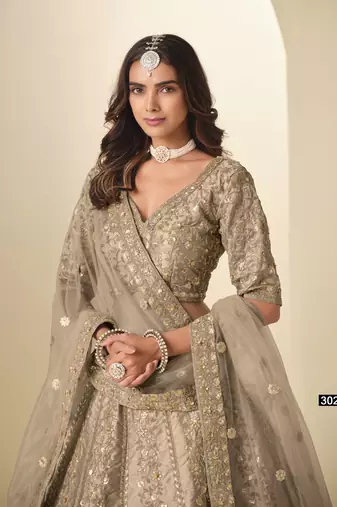 Brown Art Silk Semi Stitched Lehenga Choli with Heavy Embroidery Work