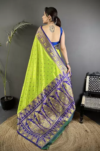 green soft silk blend intricate motifs zari weaving banarasi saree with contrast weaving border