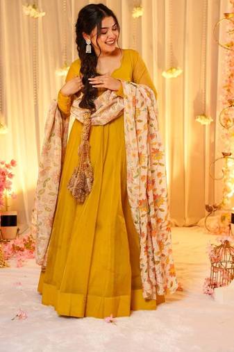 Tebby silk gown paired with contrast printed floral dupatta