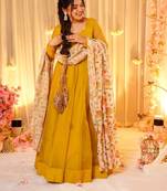 Tebby silk gown paired with contrast printed floral dupatta