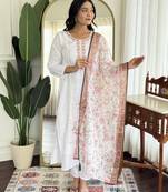 White color embroidered rayon salwar kameez