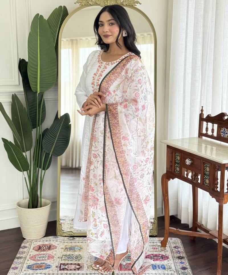 White color embroidered rayon salwar kameez