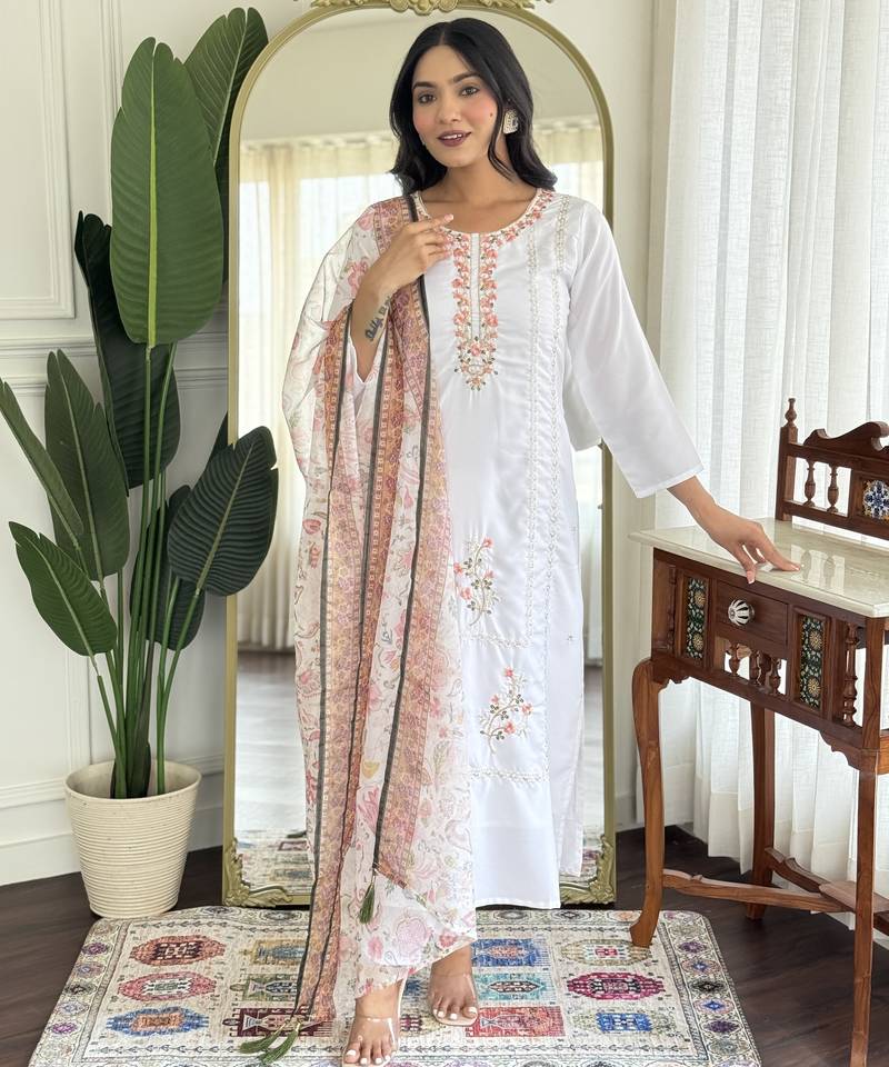 White color embroidered rayon salwar kameez