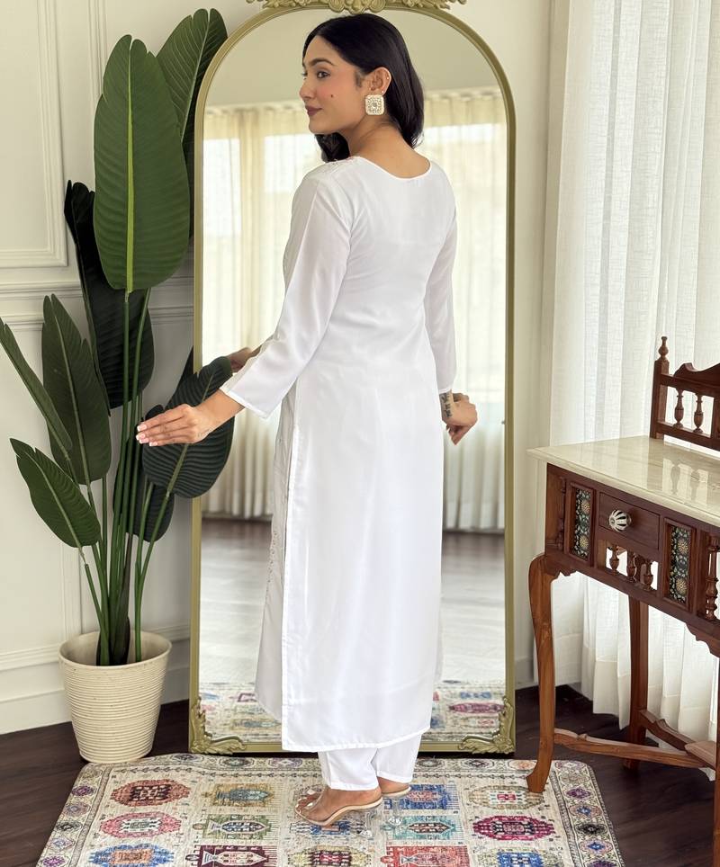 White color embroidered rayon salwar kameez